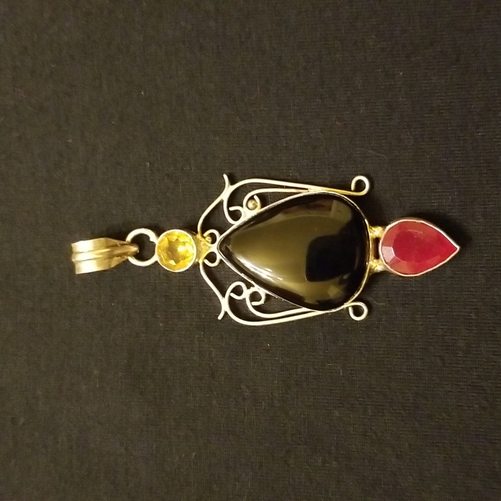 Sterling silver pendant citrine,  onyx, ruby red quartz.